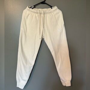 Nike pale yellow joggers size small